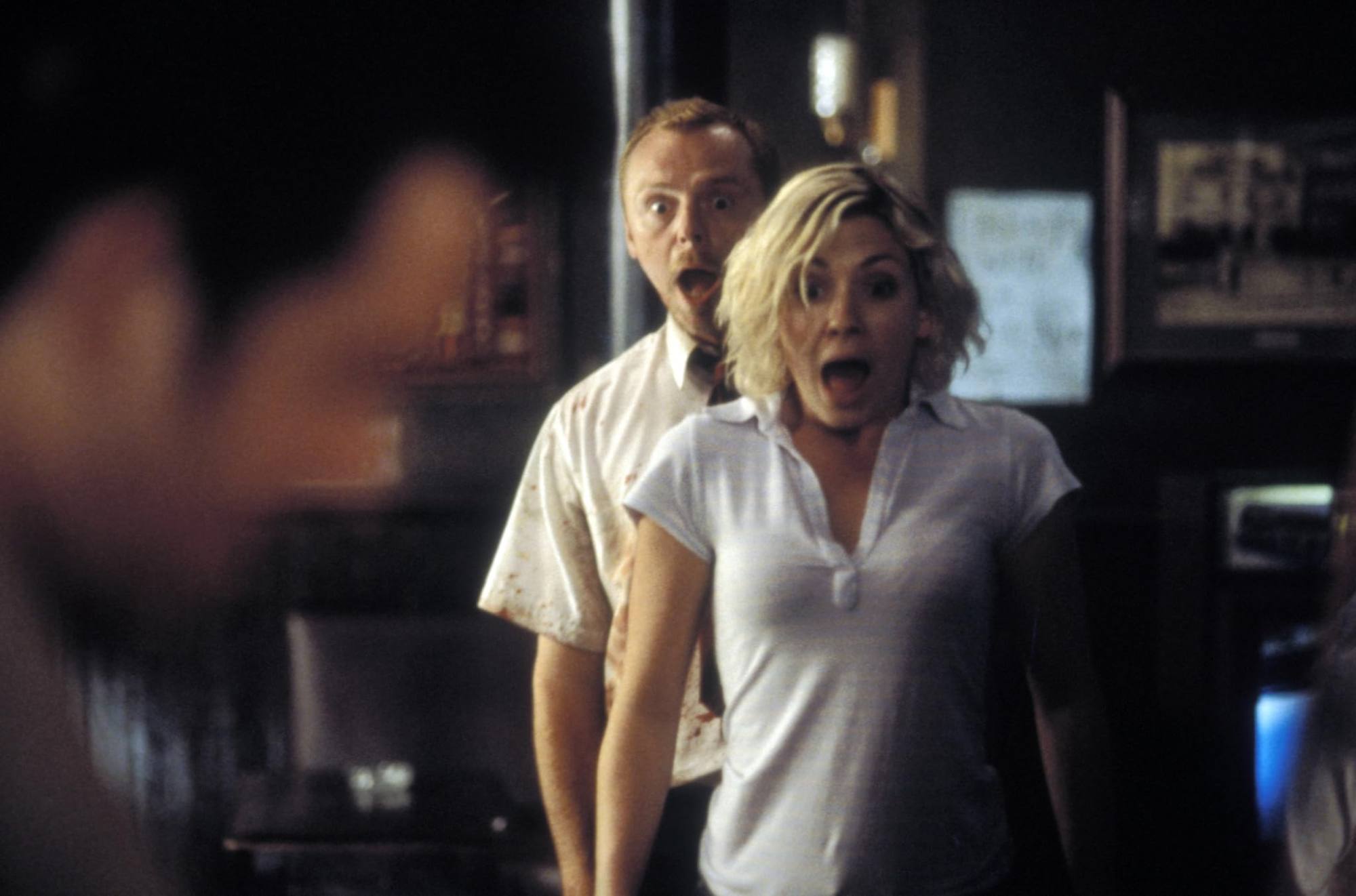Kate Ashfield (front) and Simon Pegg in a still from Shaun of the Dead. Photo: Rogue Pictures.