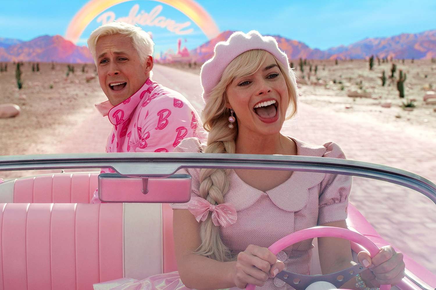 - Zombie Gaming Ryan Gosling screaming behind Margot Robbie in a still from Barbie